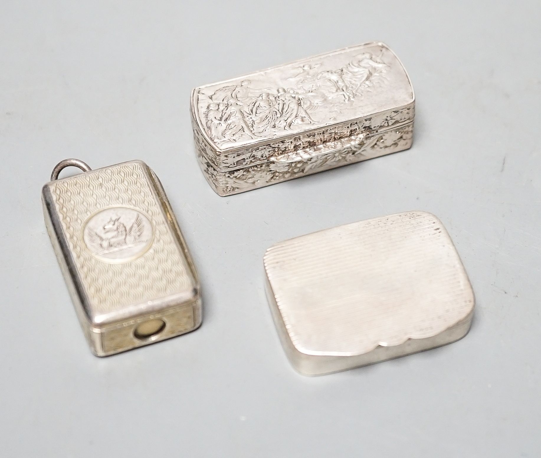 A Victorian silver gilt combination snuff box/ cigar cutter? London, 1855, 32mm and two later boxes.